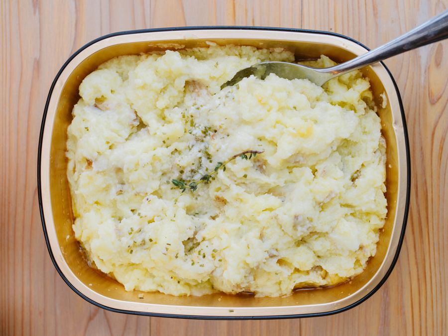 Mashed potatoes with thyme in a tray